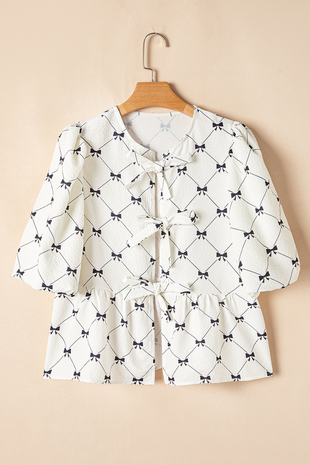 Bow print bubble sleeve top