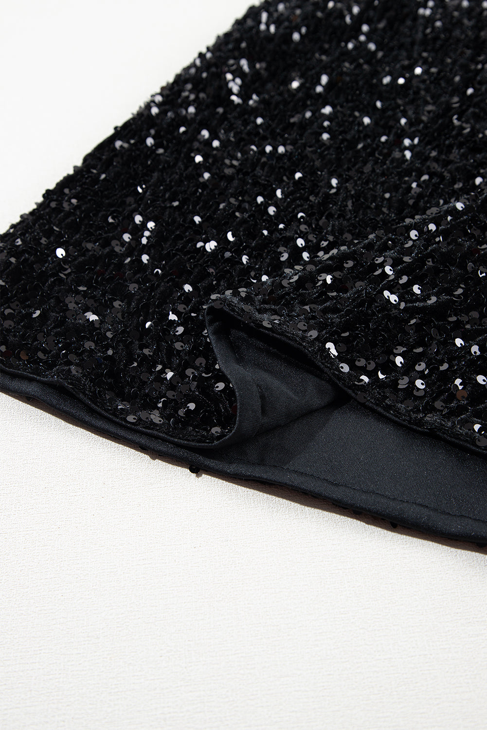 Black sequin mini skirt