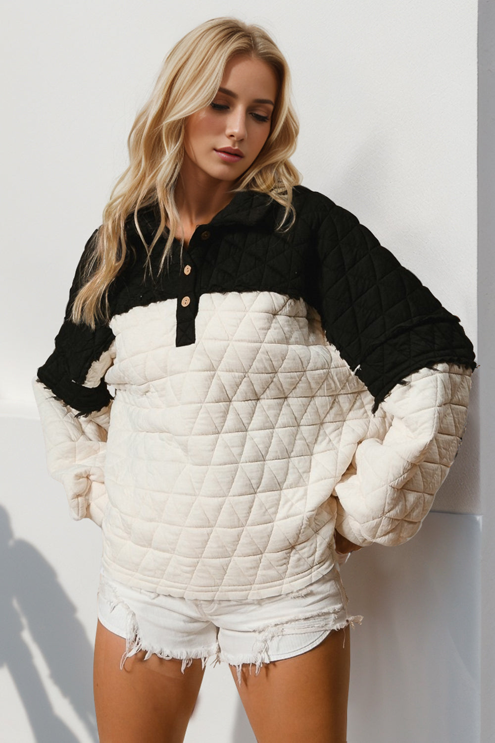 Black and cream quilted pullover